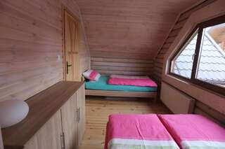 Комплексы для отдыха с коттеджами/бунгало Sosnowe Domki Реваль Шале с двумя спальнями-9