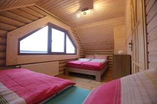 Комплексы для отдыха с коттеджами/бунгало Sosnowe Domki Реваль Шале с двумя спальнями-3