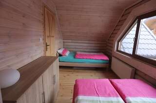 Комплексы для отдыха с коттеджами/бунгало Sosnowe Domki Реваль Шале с двумя спальнями-37